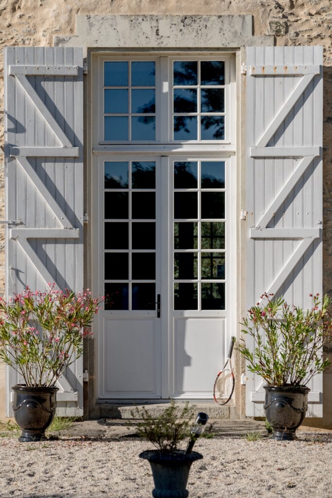 Porte fenêtre avec soubassement plein et petit bois