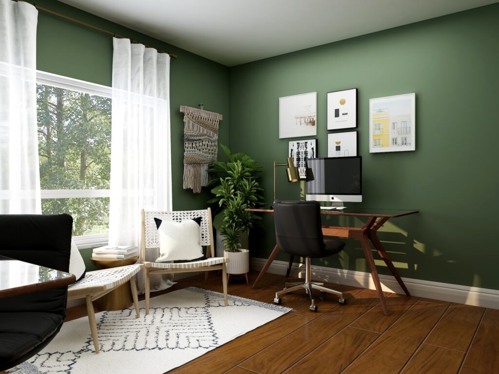 un espace bureau à la maison moderne, avec murs verts, chaises ergonomique, bureau en bois et verre, et tapis