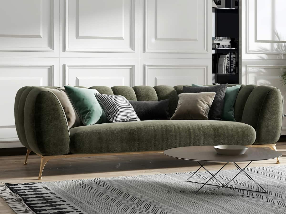 Canapé velour vert dans salon