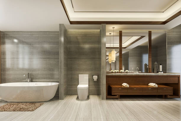 Salle de bain luxueuse pour famille avec baignoire toilettes et installations multiples